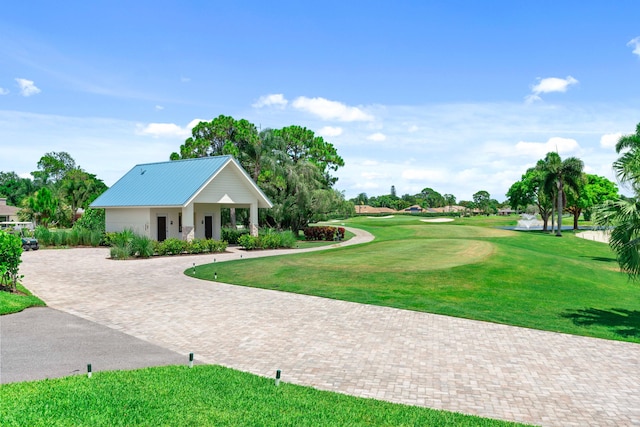 6204 Celadon Cir, Palm Beach Gardens, FL 33418 - view of home's community featuring decorative driveway, a lawn, and golf course view
