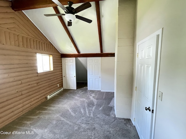 345 E Jefferson, Priest River, ID 83856 - unfurnished bedroom featuring a baseboard heating unit, carpet floors, and log walls