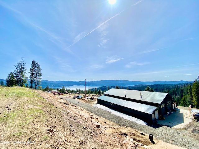 view of dock featuring a mountain view