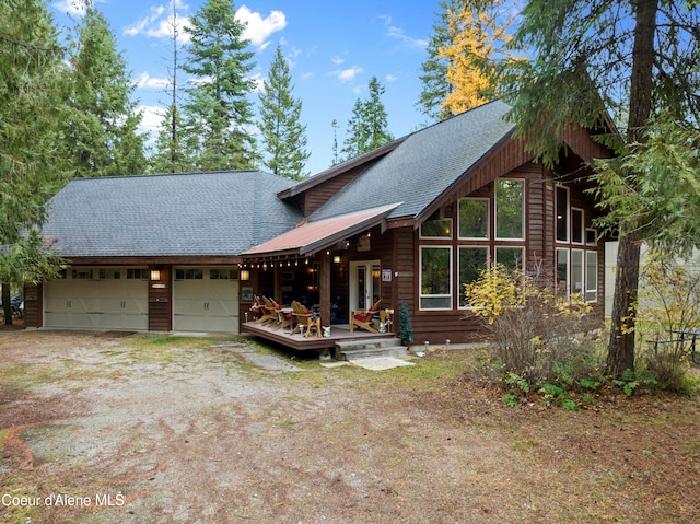 log home with a garage