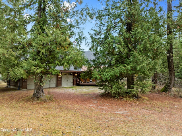 view of yard with a garage