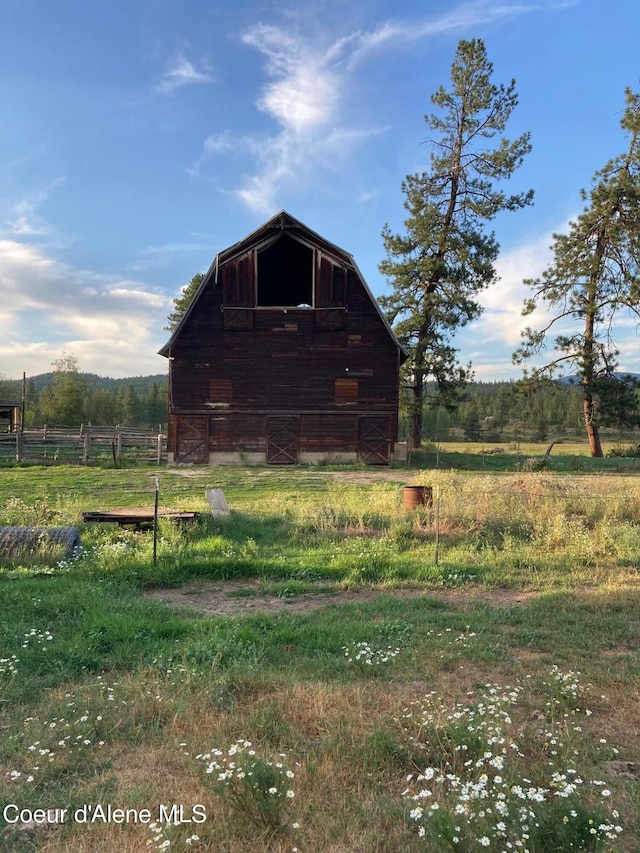 view of outdoor structure featuring a rural view