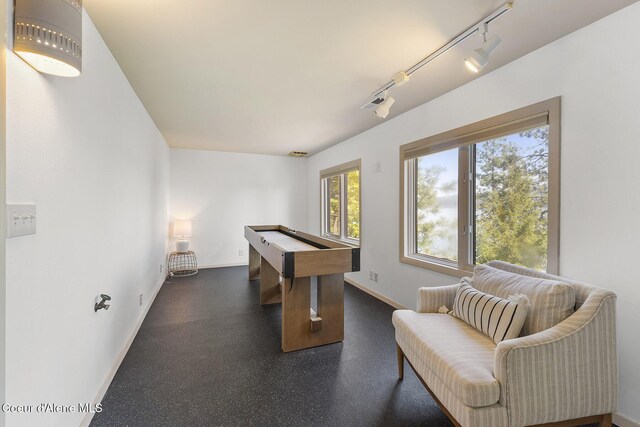 2772 W Lutherhaven Rd, Coeur Dalene, ID 83814 - rec room with rail lighting, baseboards, billiards, and a dark floor