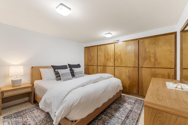2772 W Lutherhaven Rd, Coeur Dalene, ID 83814 - bedroom featuring light tile patterned floors and visible vents