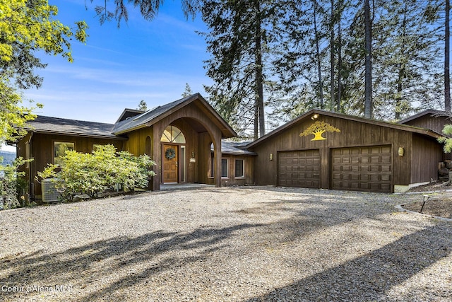 2772 W Lutherhaven Rd, Coeur Dalene, ID 83814 - view of front of home with gravel driveway and a garage