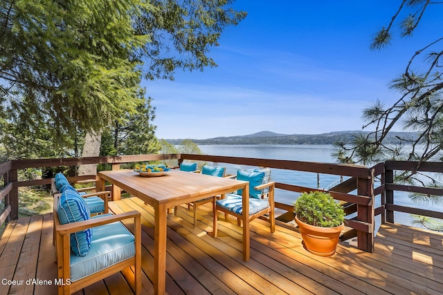 2772 W Lutherhaven Rd, Coeur Dalene, ID 83814 - wooden terrace with a water view and outdoor dining area