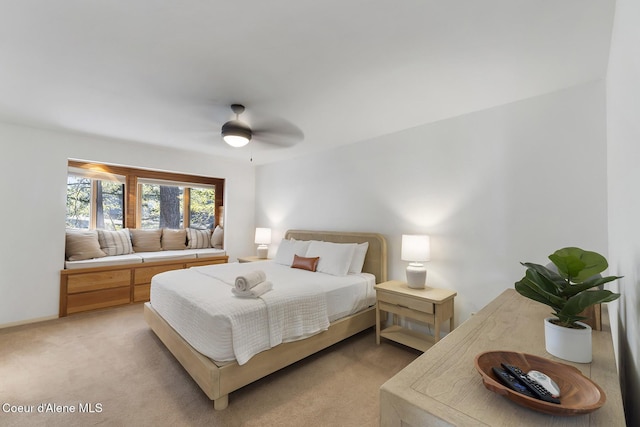 2772 W Lutherhaven Rd, Coeur Dalene, ID 83814 - bedroom with light colored carpet and a ceiling fan