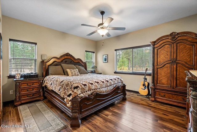 bedroom featuring ceiling fan and dark wood-type flooring