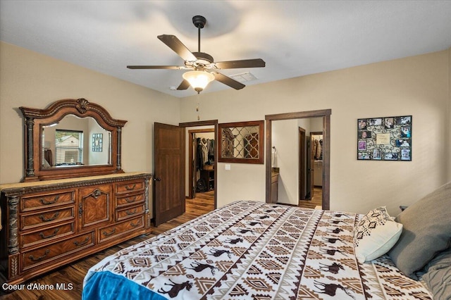 bedroom with wood-type flooring and ceiling fan