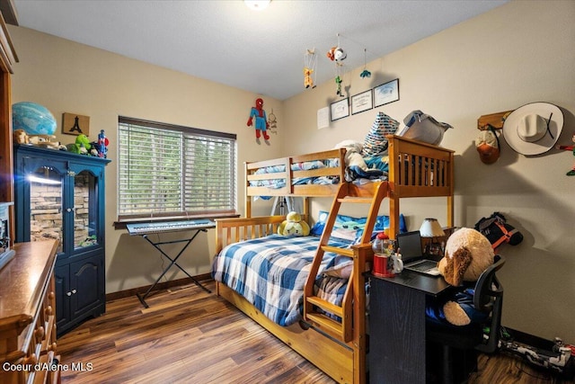 bedroom featuring dark hardwood / wood-style floors