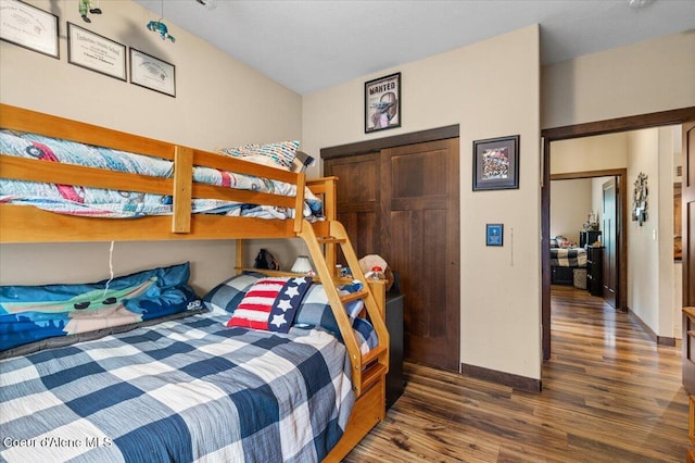 bedroom featuring dark hardwood / wood-style flooring