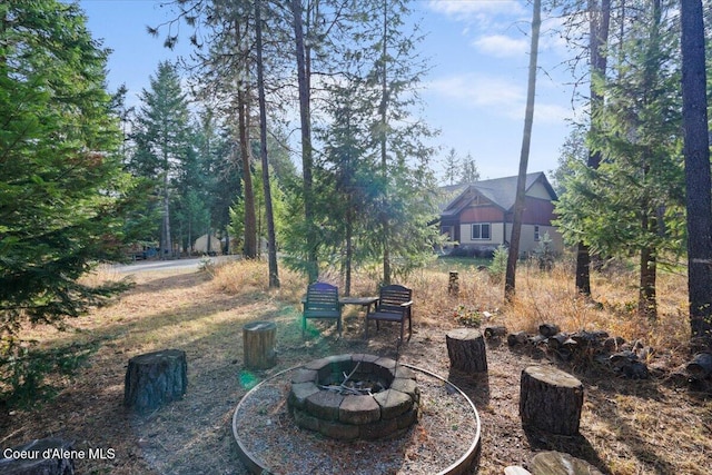 view of patio with an outdoor fire pit