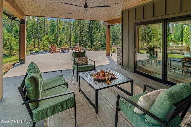 view of patio featuring an outdoor living space and ceiling fan