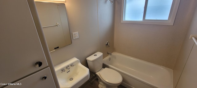 bathroom with sink and toilet