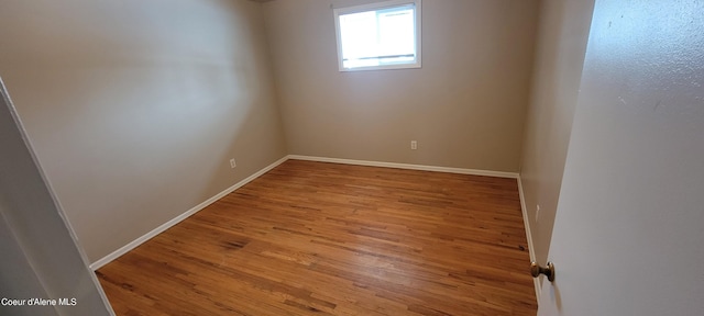 unfurnished room featuring light hardwood / wood-style floors