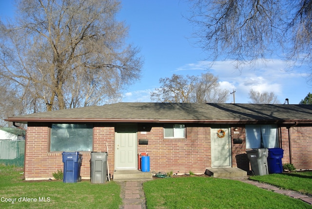 view of front of house with a front lawn