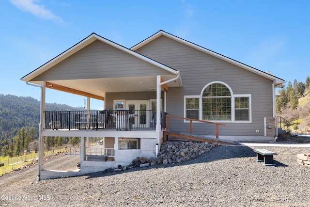 view of front of home with a deck