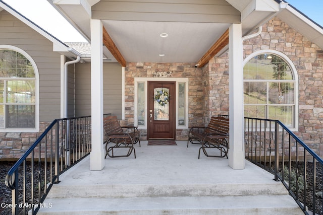 entrance to property with covered porch