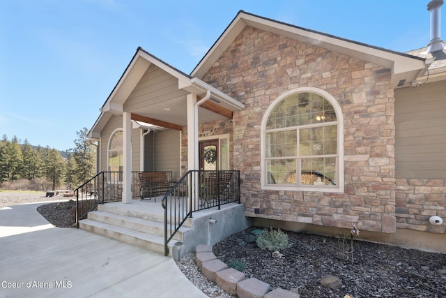 view of front of property featuring covered porch