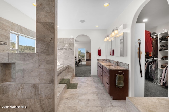 bathroom featuring tile floors and oversized vanity