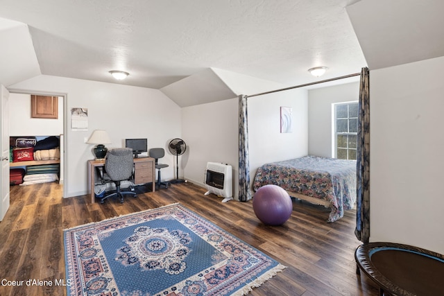 bedroom with lofted ceiling and dark wood-type flooring