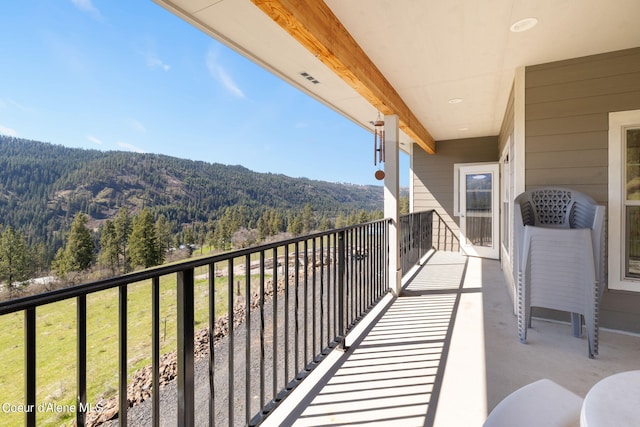 balcony featuring a mountain view