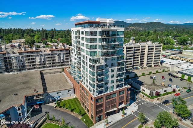 view of building exterior featuring a mountain view