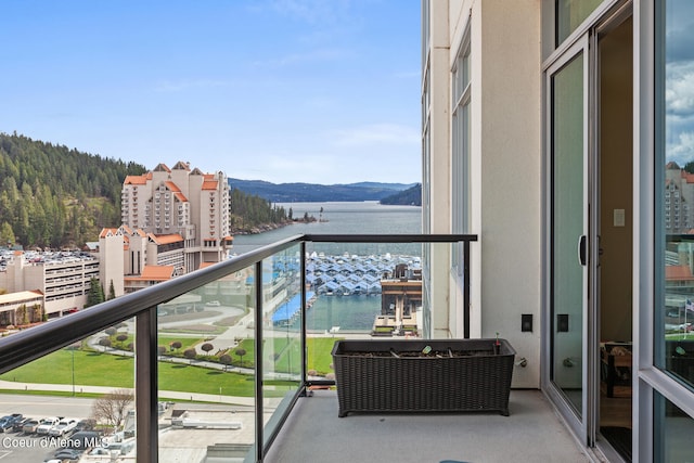 balcony featuring a water view