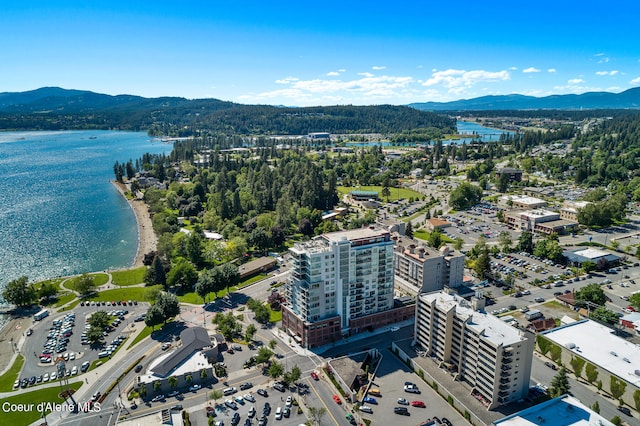 bird's eye view with a water and mountain view