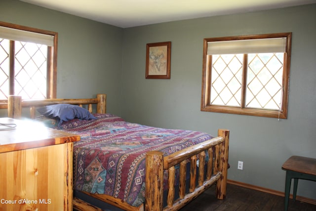 bedroom featuring dark hardwood / wood-style floors