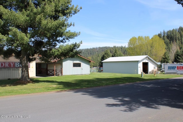 view of front of home with a front lawn