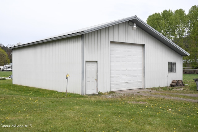 garage with a yard