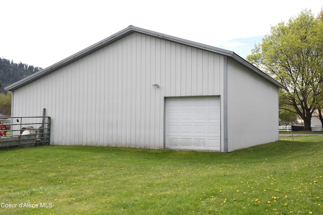 garage featuring a yard