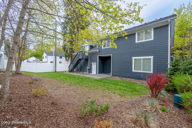 back of property featuring a patio