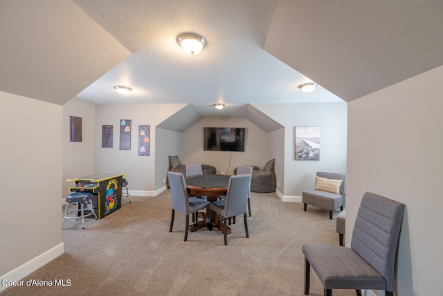 view of carpeted dining area