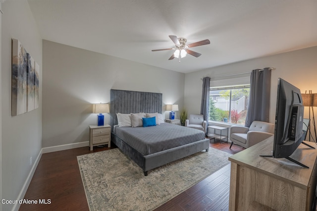 bedroom featuring dark hardwood / wood-style floors and ceiling fan