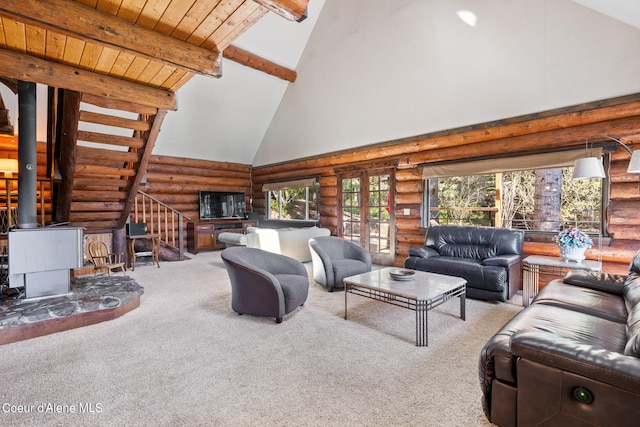 carpeted living room featuring log walls, beamed ceiling, high vaulted ceiling, and a wood stove