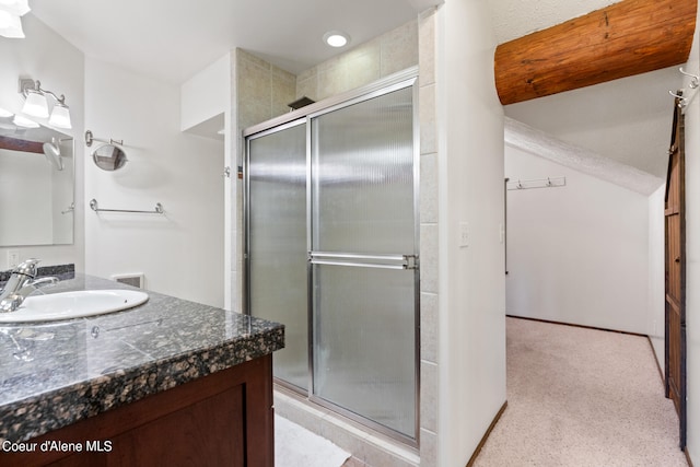 bathroom with vanity and walk in shower