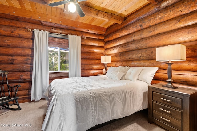 carpeted bedroom featuring ceiling fan, beamed ceiling, wooden ceiling, and rustic walls