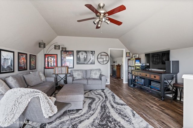 living room featuring vaulted ceiling, dark hardwood / wood-style floors, and ceiling fan