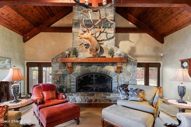 living room featuring high vaulted ceiling, wooden ceiling, a stone fireplace, and beamed ceiling