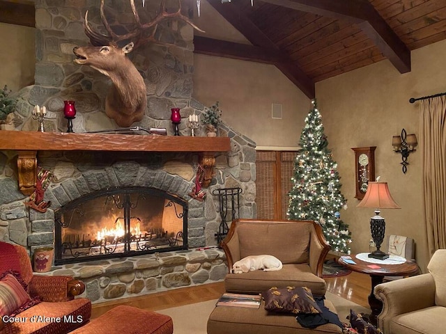 living room with hardwood / wood-style flooring, a fireplace, wood ceiling, and lofted ceiling with beams