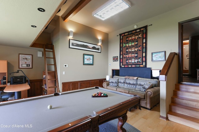 game room featuring vaulted ceiling with beams, pool table, and light wood-type flooring