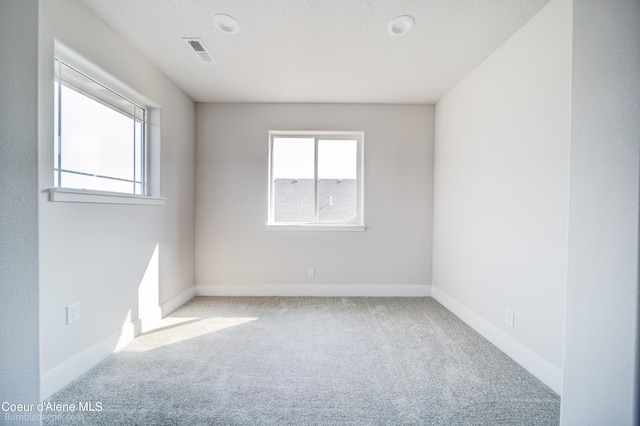 empty room with carpet floors