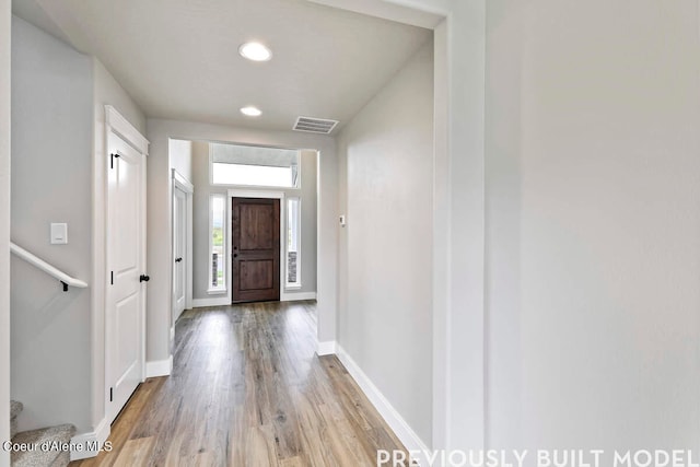 doorway to outside featuring hardwood / wood-style flooring