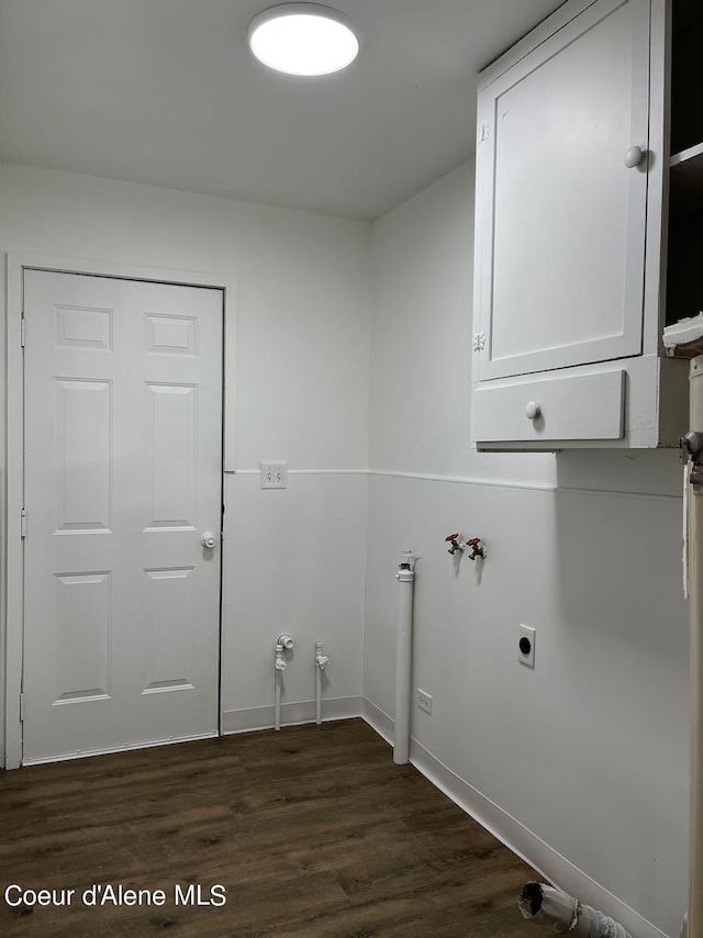 washroom featuring dark wood-type flooring