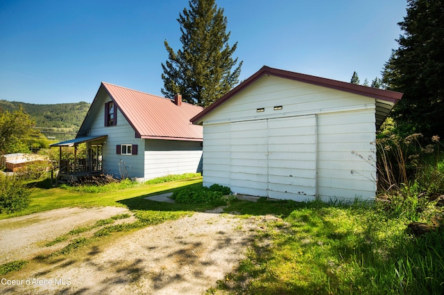 view of home's exterior featuring a lawn