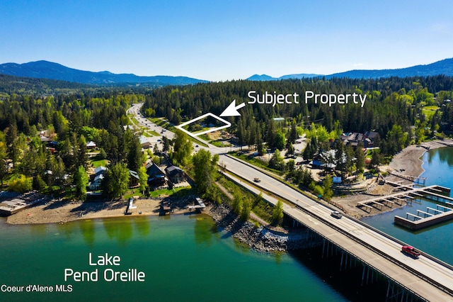 aerial view with a water and mountain view