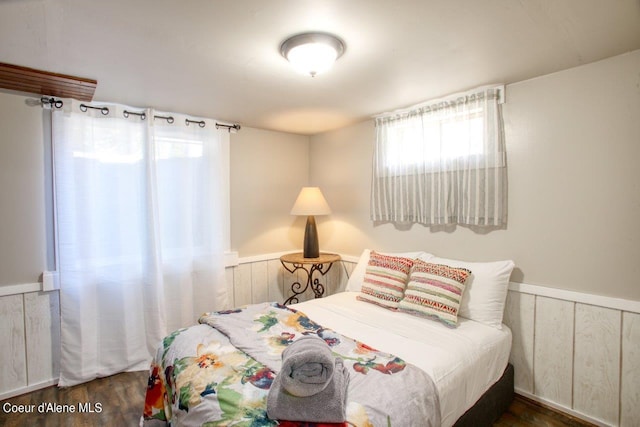 bedroom featuring dark hardwood / wood-style flooring