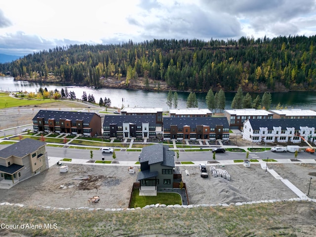 bird's eye view with a water view